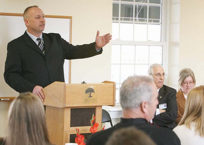 Oldmans Township Mayor William Miller, left, speaks during the Sustainable Energy Center Dedication in Oldmans Township on Friday. 